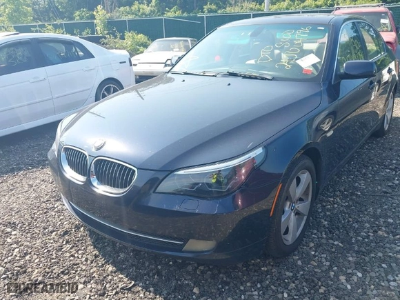 2008 BMW 5 Series 528xi with VIN WBANV13558CZ58594, listed as a IAAI auction lot 39716458 with 999,999 mi miles. Bid and sale history available at carsss.com. Image 6.