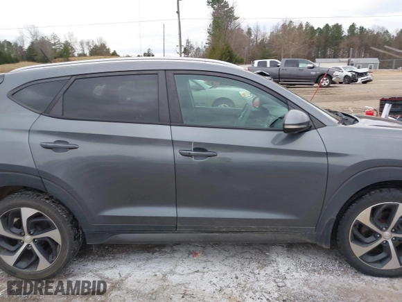 2016 Hyundai Tucson Sport with VIN KM8J33A21GU254828, listed as a IAAI auction lot 41297692 with 134,394 mi miles. Bid and sale history available at carsss.com. Image 13.