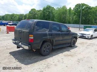2004 Chevrolet Tahoe LT with VIN 1GNEC13Z64J301294, listed as a IAAI auction lot 42097936 with 1 mi miles. Bid and sale history available at carsss.com. Image 4.
