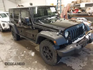 2016 Jeep Wrangler Unlimited Sport with VIN 1C4BJWDG9GL114359, listed as a IAAI auction lot 41422535 with 133,462 mi miles and . Bid and sale history available at DreamBid. Image 1.