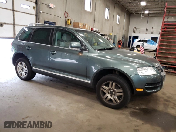2004 Volkswagen Touareg z VIN WVGCM67L94D032492, wystawiony jako Copart lot #72205044 z przebiegiem 98 482 mil mil oraz Czysty tytuł • Clean title. Historia ofert i sprzedaży dostępna na DreamBid. Obrazek 4.