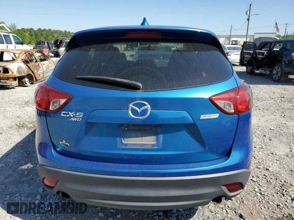 2013 Mazda CX-5 Touring with VIN JM3KE4CE7D0109173, listed as a Copart auction lot 52594285 with 149,288 mi miles and Clean Title. Bid and sale history available at DreamBid. Image 6.