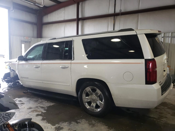 2020 Chevrolet Suburban Premier with VIN 1GNSKJKC5LR174248, listed as a Copart auction lot 73365664 with 124,755 mi miles and Salvage Title. Bid and sale history available at carsss.com. Image 2.