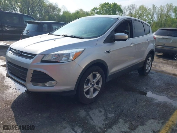 2015 Ford Escape SE with VIN 1FMCU9GX5FUC62439, listed as a IAAI auction lot 42066128 with 137,845 mi miles. Bid and sale history available at carsss.com. Image 2.