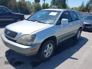 1999 Lexus RX 300 z VIN JT6HF10U2X0025123, wystawiony jako IAAI lot #42317621 z przebiegiem 158 140 mil mil oraz . Historia ofert i sprzedaży dostępna na DreamBid. Obrazek 2.