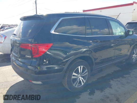 2016 Honda Pilot EX-L with VIN 5FNYF6H53GB048317, listed as a IAAI auction lot 41826297 with 127,672 mi miles. Bid and sale history available at carsss.com. Image 4.
