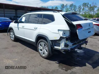 2021 Volkswagen Atlas SE z VIN 1V2WR2CA2MC529355, wystawiony jako IAAI lot #41972048 z przebiegiem 63 970 mil mil oraz . Historia ofert i sprzedaży dostępna na DreamBid. Obrazek 3.