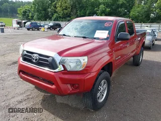 2014 Toyota Tacoma with VIN 3TMMU4FN8EM068048, listed as a IAAI auction lot 42548095 with 126,332 mi miles and . Bid and sale history available at DreamBid. Image 6.