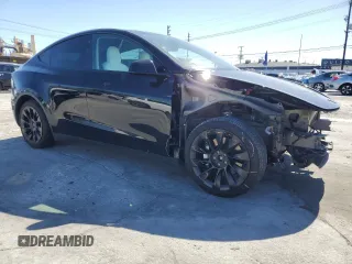 2022 Tesla Model Y Long Range z VIN 7SAYGDEE2NF442073, wystawiony jako Copart lot #49180135 z przebiegiem 34 742 mil mil oraz Szkoda całkowita • Salvage title. Historia ofert i sprzedaży dostępna na DreamBid. Obrazek 4.