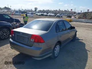 2004 Honda Civic LX with VIN 2HGES16654H579927, listed as a IAAI auction lot 41911814 with 233,803 mi miles. Bid and sale history available at carsss.com. Image 4.