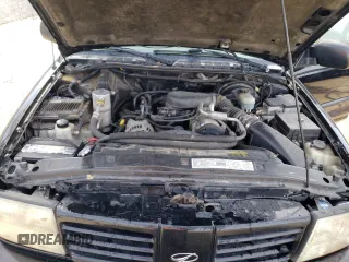 2000 Oldsmobile Bravada z VIN 1GHDT13W3Y2178106, wystawiony jako Copart lot #85069954 z przebiegiem 211 164 mil mil oraz Szkody całkowita. Historia ofert i sprzedaży dostępna na DreamBid. Obrazek 12.