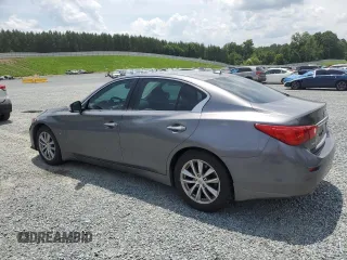 2014 Infiniti Q50 Sport with VIN JN1BV7AR4EM702521, listed as a Copart auction lot 61017205 with 61,317 mi miles and Salvage title. Bid and sale history available at DreamBid. Image 2.