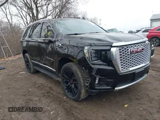 2021 GMC Yukon Denali with VIN 1GKS2DKL2MR474572, listed as a IAAI auction lot 41149462 with 51,888 mi miles. Bid and sale history available at carsss.com. Image 1.