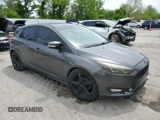 2015 Ford Focus Titanium z VIN 1FADP3N2XFL357224, wystawiony jako Copart lot #55626575 z przebiegiem 159 422 mil mil oraz Szkoda całkowita • Salvage title. Historia ofert i sprzedaży dostępna na DreamBid. Obrazek 4.