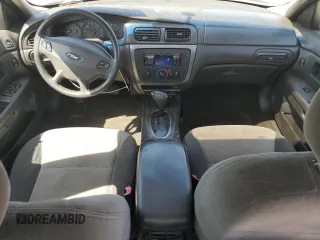 2003 Ford Taurus SES Standard с VIN 1FAFP55S63G145476, выставлен на аукционе Copart как лот 52980375 с пробегом 270 376 миль миль и Списание • Salvage title. История ставок и продаж доступна на DreamBid. Изображение 8.