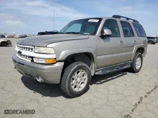 2003 Chevrolet Tahoe Z71 with VIN 1GNEK13T43R295137, listed as a Copart auction lot 52556745 with 292,288 mi miles and Salvage Title. Bid and sale history available at carsss.com. Image 1.
