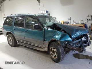 1998 Mercury Mountaineer z VIN 4M2ZU55PXWUJ01704, wystawiony jako Copart lot #50892605 z przebiegiem 196 987 mil mil oraz Szkoda całkowita • Salvage title. Historia ofert i sprzedaży dostępna na DreamBid. Obrazek 4.