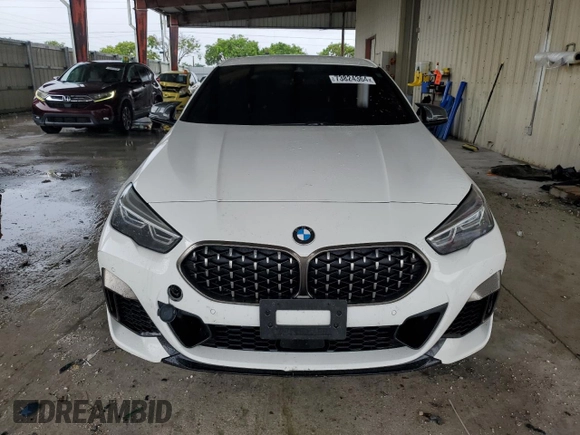 2020 BMW 2 Series M235i xDrive with VIN WBA13AL07L7F63068, listed as a Copart auction lot 73824364 with 62,138 mi miles and Salvage Title. Bid and sale history available at carsss.com. Image 5.