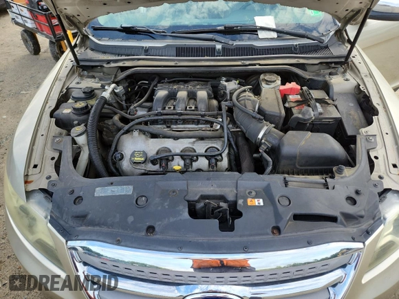 2010 Ford Taurus Limited with VIN 1FAHP2FW7AG138753, listed as a Copart auction lot 64880025 with 242,728 mi miles and Clean title. Bid and sale history available at DreamBid. Image 11.