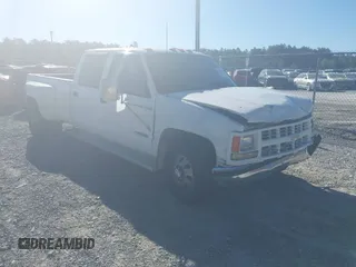 1996 Chevrolet Silverado 3500 z VIN 1GCHC33J4TF008846, wystawiony jako IAAI lot #41802009 z przebiegiem 181 444 mil mil oraz . Historia ofert i sprzedaży dostępna na DreamBid. Obrazek 1.