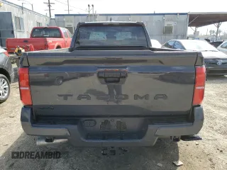 2025 Toyota Tacoma SR with VIN 3TMLB5JNXSM095729, listed as a Copart auction lot 46190185 with 921 mi miles and Salvage Title. Bid and sale history available at DreamBid. Image 6.