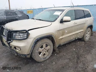 2011 Jeep Grand Cherokee Laredo with VIN 1J4RR4GG9BC563065, listed as a IAAI auction lot 41798136 with 192,149 mi miles. Bid and sale history available at carsss.com. Image 17.