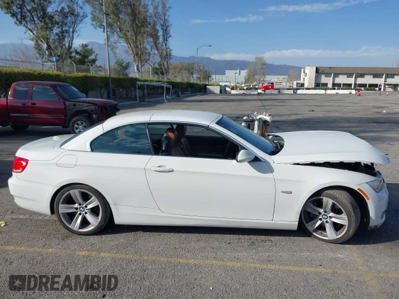 2007 BMW 3 Series 335i with VIN WBAWL73547PX47052, listed as a IAAI auction lot 41700828 with 64,409 mi miles. Bid and sale history available at carsss.com. Image 13.