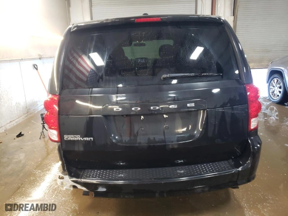 2014 Dodge Grand Caravan SXT with VIN 2C4RDGCG4ER104887, listed as a Copart auction lot 48569215 with 126,910 mi miles and Salvage Title. Bid and sale history available at carsss.com. Image 6.