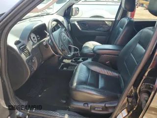 2003 Ford Escape Limited with VIN 1FMCU94113KE05720, listed as a Copart auction lot 58937564 with 120,020 mi miles and Salvage Title. Bid and sale history available at carsss.com. Image 7.