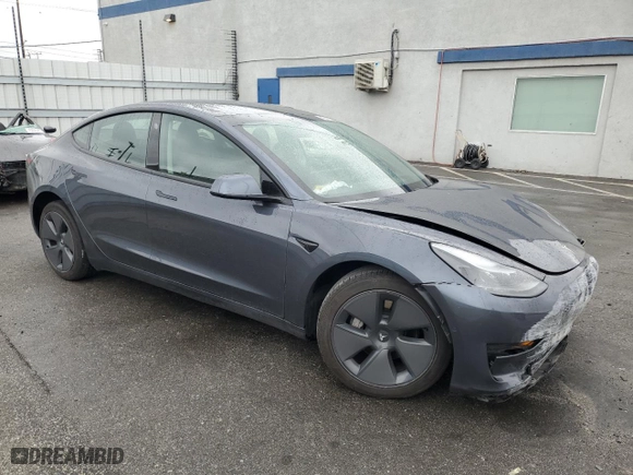 2021 Tesla Model 3 Standard Range Plus with VIN 5YJ3E1EA1MF911340, listed as a Copart auction lot 45011375 with 54,084 mi miles and Salvage Title. Bid and sale history available at carsss.com. Image 4.