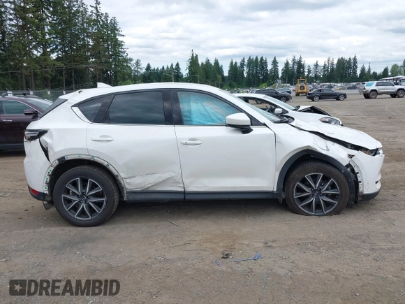 2018 Mazda CX-5 Grand Touring with VIN JM3KFBDM1J0382306, listed as a IAAI auction lot 42554947 with 121,303 mi miles and . Bid and sale history available at DreamBid. Image 13.
