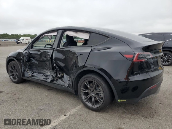 2024 Tesla Model Y Long Range with VIN 7SAYGDEE4RF198027, listed as a Copart auction lot 64008945 with 7,826 mi miles and Salvage title. Bid and sale history available at DreamBid. Image 2.