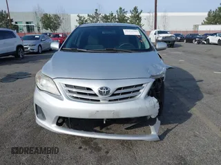 2013 Toyota Corolla L with VIN 2T1BU4EE0DC104010, listed as a IAAI auction lot 41473768 with 67,808 mi miles. Bid and sale history available at carsss.com. Image 6.