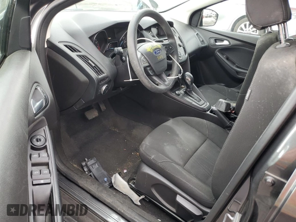 2017 Ford Focus SE with VIN 1FADP3FE3HL235896, listed as a Copart auction lot 50910975 with 74,502 mi miles and Salvage Title. Bid and sale history available at carsss.com. Image 8.