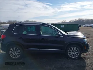 2012 Volkswagen Tiguan SE with VIN WVGAV7AX3CW531264, listed as a IAAI auction lot 41651242 with 190,669 mi miles and . Bid and sale history available at DreamBid. Image 13.