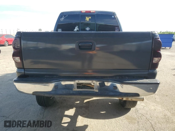 2005 Chevrolet Silverado 1500 LT with VIN 2GCEK13TX51247047, listed as a Copart auction lot 52769025 with 201,593 mi miles and Salvage Title. Bid and sale history available at DreamBid. Image 6.