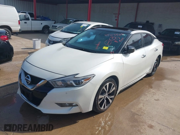 2016 Nissan Maxima SL with VIN 1N4AA6AP5GC383075, listed as a IAAI auction lot 41415505 with 164,392 mi miles and . Bid and sale history available at DreamBid. Image 18.