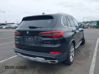 2023 BMW X5 xDrive40i with VIN 5UXCR6C0XP9P90557, listed as a IAAI auction lot 41860825 with 49,737 mi miles. Bid and sale history available at carsss.com. Image 4.