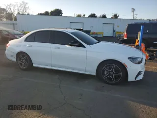 2021 Mercedes-Benz E-Class E 450 with VIN W1KZF5KBXMA934142, listed as a Copart auction lot 43231135 with 39,090 mi miles and Salvage Title. Bid and sale history available at carsss.com. Image 4.