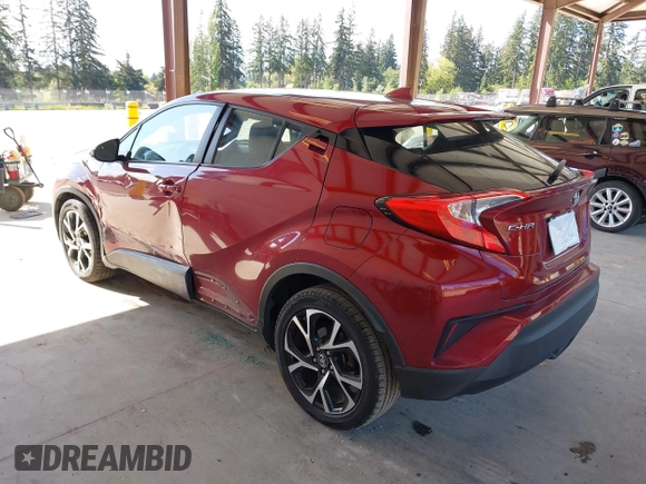 2018 Toyota C-HR XLE with VIN NMTKHMBX6JR027381, listed as a IAAI auction lot 42149905 with 118,897 mi miles and . Bid and sale history available at DreamBid. Image 3.