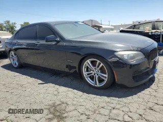 2011 BMW 7 Series 750Li with VIN WBAKB8C5XBCY66022, listed as a Copart auction lot 65729345 with 132,832 mi miles and Clean title. Bid and sale history available at DreamBid. Image 4.