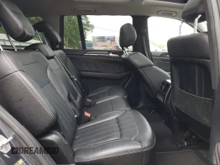 2015 Mercedes-Benz GL 450 z VIN 4JGDF6EE7FA455093, wystawiony jako Copart lot #57187135 z przebiegiem 105 573 mil mil oraz Tytuł czysty. Historia ofert i sprzedaży dostępna na DreamBid. Obrazek 11.