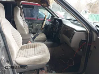 1995 Jeep Grand Cherokee Laredo with VIN 1J4GZ58SXSC697003, listed as a IAAI auction lot 41259889 with 248,595 mi miles. Bid and sale history available at carsss.com. Image 5.