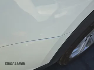 2023 Volkswagen Atlas SE z VIN 1V2HR2CA4PC526289, wystawiony jako IAAI lot #42734426 z przebiegiem 46 454 mil mil oraz . Historia ofert i sprzedaży dostępna na DreamBid. Obrazek 13.