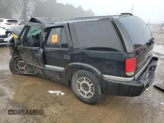 1999 GMC Jimmy SLE with VIN 1GKDT13W3X2522381, listed as a Copart auction lot 83219014 with 0 mi miles and Non Repairable. Bid and sale history available at carsss.com. Image 2.