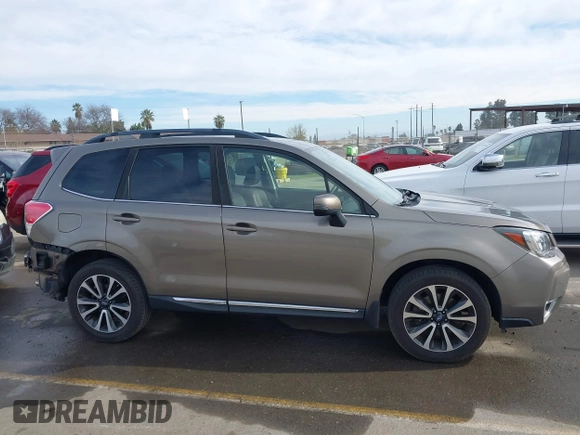 2017 Subaru Forester Touring with VIN JF2SJGWC8HH802262, listed as a IAAI auction lot 41681997 with 75,993 mi miles. Bid and sale history available at carsss.com. Image 14.