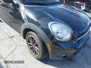 2015 MINI Countryman S with VIN WMWZC3C55FWT04354, listed as a IAAI auction lot 41346143 with Not provided miles and . Bid and sale history available at DreamBid. Image 6.