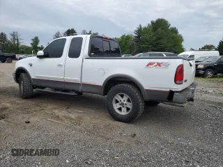 2003 Ford F-150 XL z VIN 2FTRX18L93CA55860, wystawiony jako Copart lot #57402295 z przebiegiem 312 879 mil mil oraz Szkoda całkowita • Salvage title. Historia ofert i sprzedaży dostępna na DreamBid. Obrazek 2.