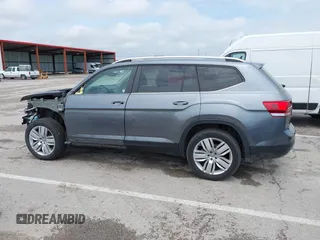 2019 Volkswagen Atlas SE z VIN 1V2WR2CAXKC611864, wystawiony jako IAAI lot #42151795 z przebiegiem 90 178 mil mil oraz . Historia ofert i sprzedaży dostępna na DreamBid. Obrazek 14.