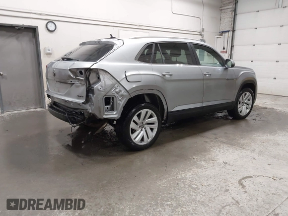 2023 Volkswagen Atlas SE z VIN 1V2KC2CA6PC210593, wystawiony jako IAAI lot #41957633 z przebiegiem 34 801 mil mil oraz . Historia ofert i sprzedaży dostępna na DreamBid. Obrazek 4.